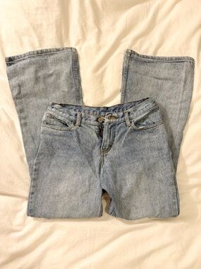 Brandy Melville John Galt low rise flare light wash Quinn jeans.